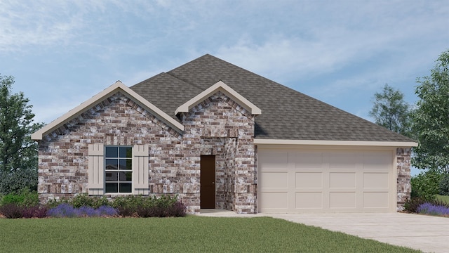 view of front of home with a garage and a front lawn