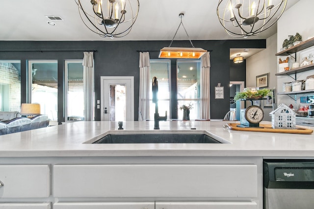 kitchen with dishwasher and plenty of natural light