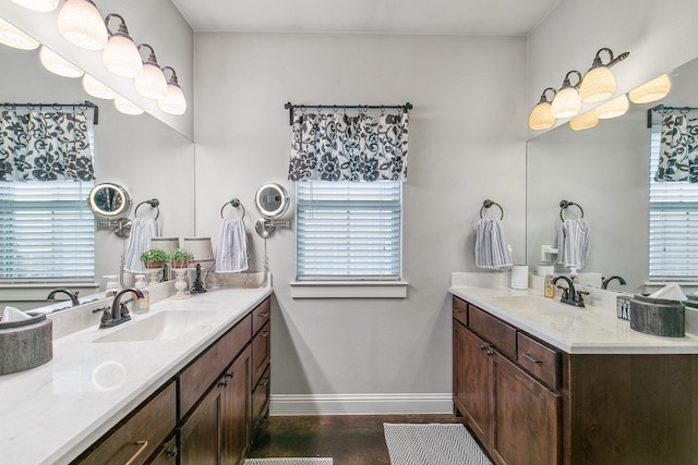 bathroom featuring vanity and wood-type flooring