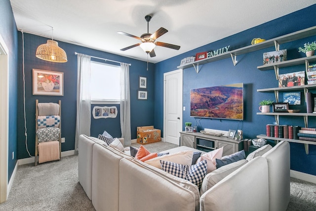 carpeted living room featuring ceiling fan