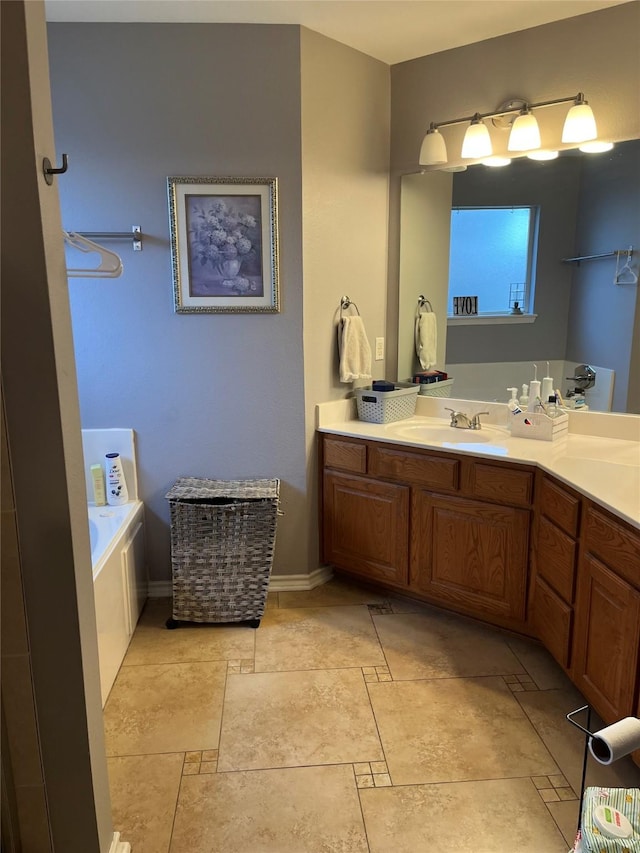 bathroom with a bathtub and vanity