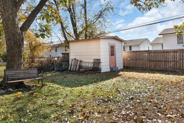 exterior space with a storage shed