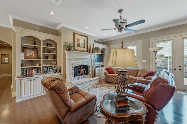 living room with french doors, ceiling fan, ornamental molding, and hardwood / wood-style floors