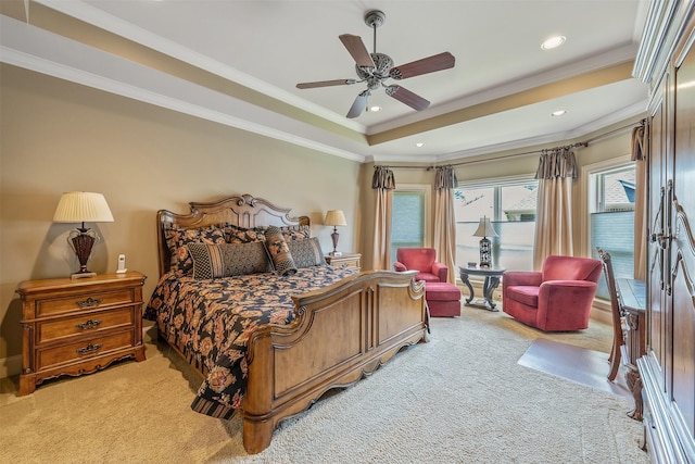 bedroom with crown molding, ceiling fan, access to exterior, light colored carpet, and a raised ceiling