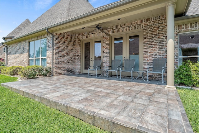 view of patio with french doors and ceiling fan