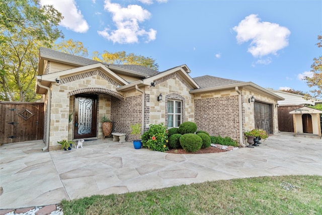 view of front of house with a garage