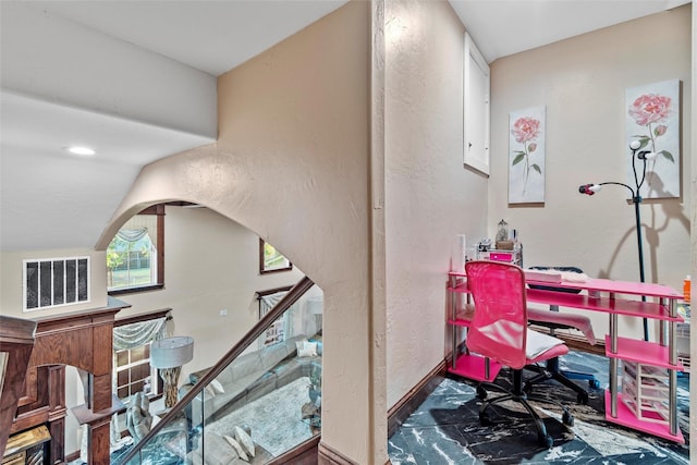 home office featuring vaulted ceiling