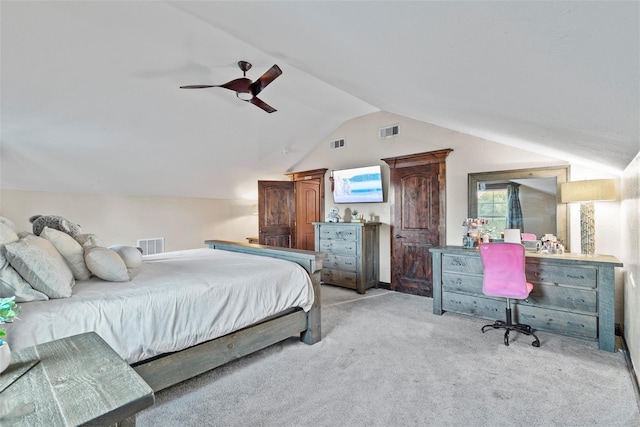 carpeted bedroom featuring ceiling fan and lofted ceiling