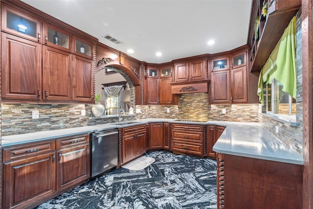 kitchen with decorative backsplash, dishwasher, stovetop, and sink