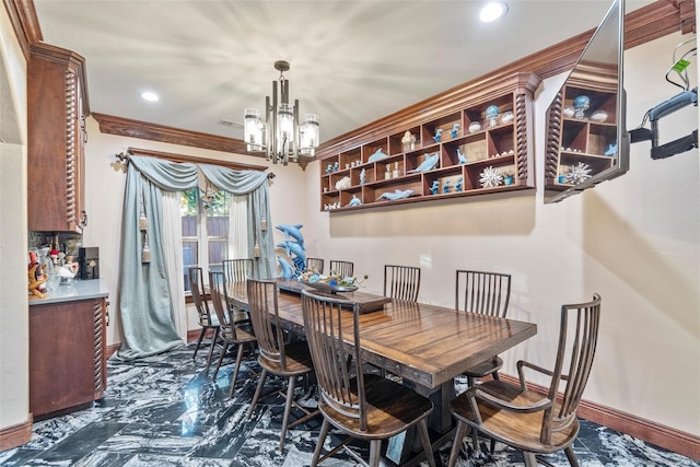 dining room featuring a chandelier and ornamental molding