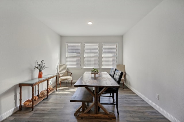 dining area featuring dark hardwood / wood-style flooring