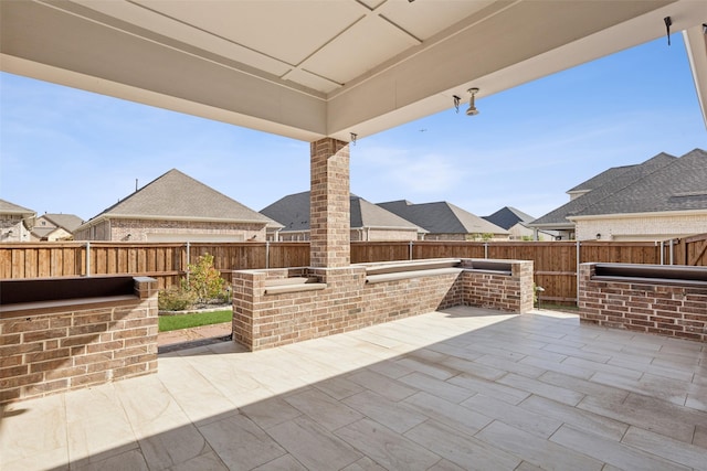 view of patio / terrace with exterior bar