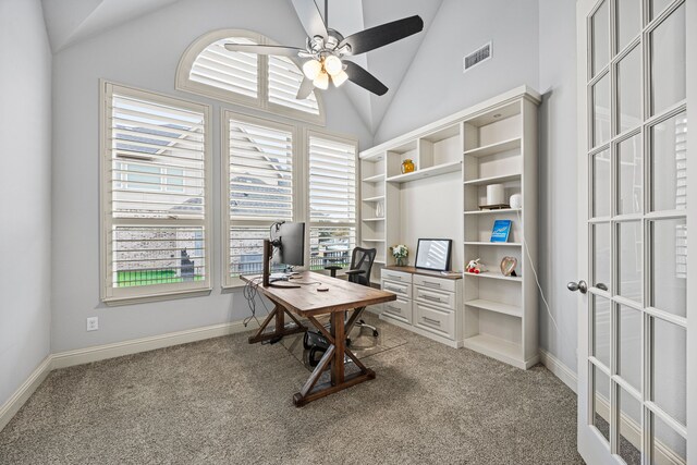 office with light colored carpet, plenty of natural light, and ceiling fan