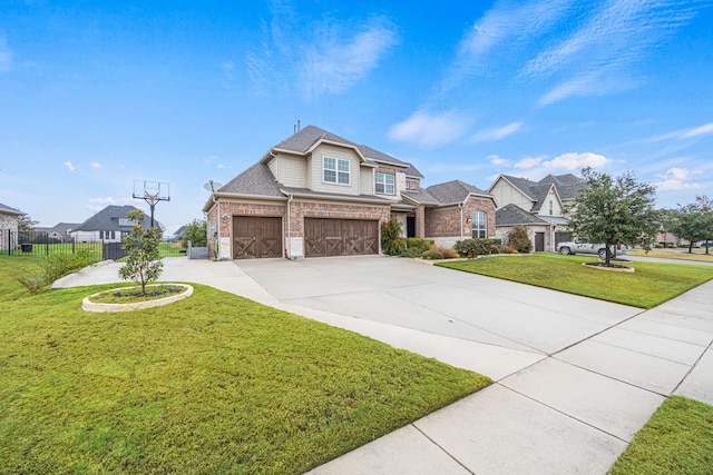 craftsman-style house featuring a garage and a front lawn