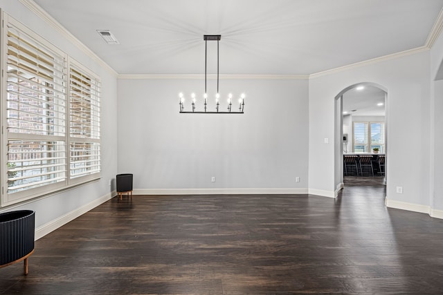 unfurnished dining area featuring crown molding and dark wood-type flooring