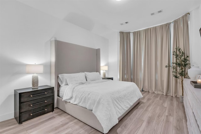 bedroom featuring light hardwood / wood-style floors