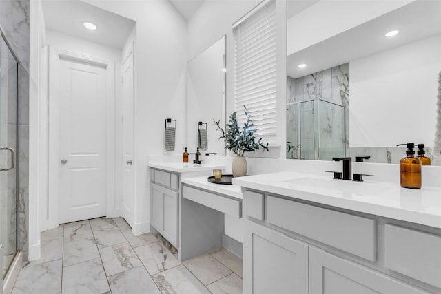 bathroom with vanity and walk in shower