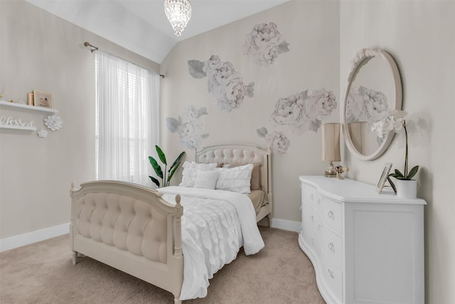 bedroom featuring light carpet and lofted ceiling