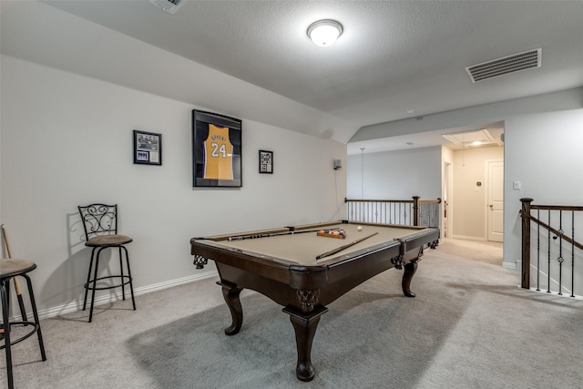 recreation room featuring light carpet