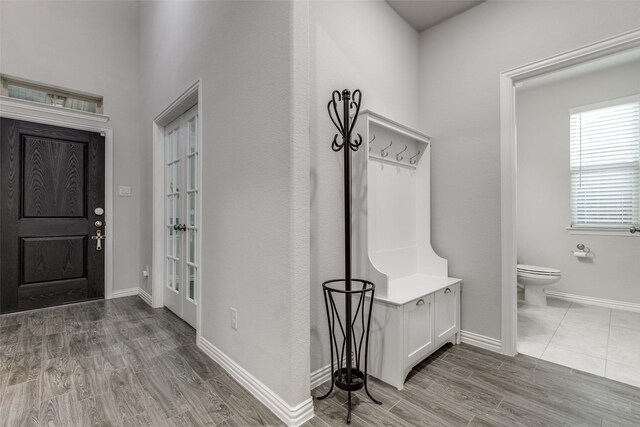 office area with dark wood-type flooring and a textured ceiling