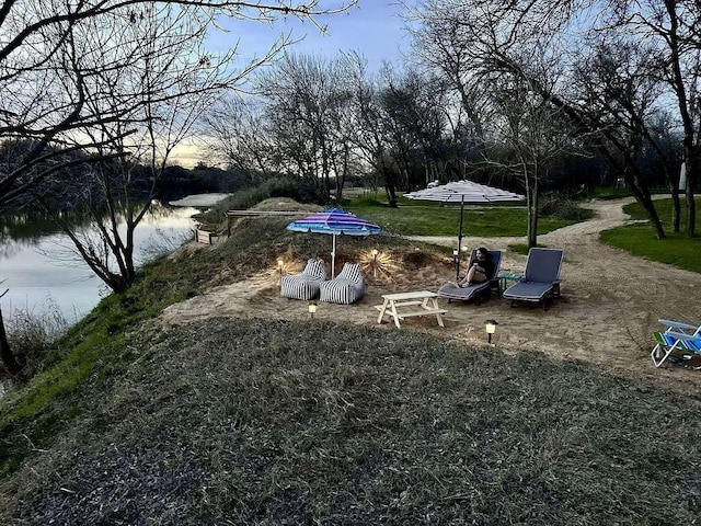 view of yard featuring a water view