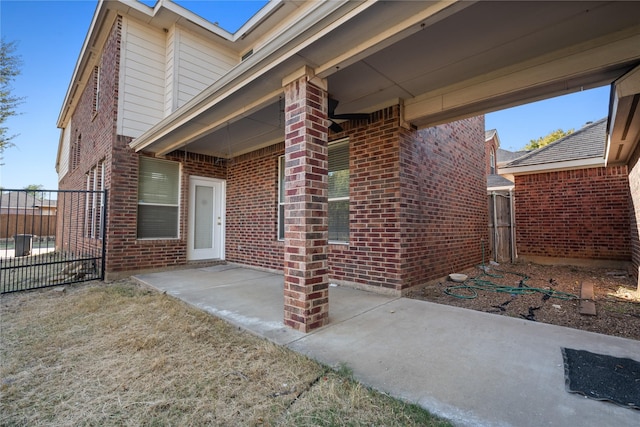 property entrance with a patio area