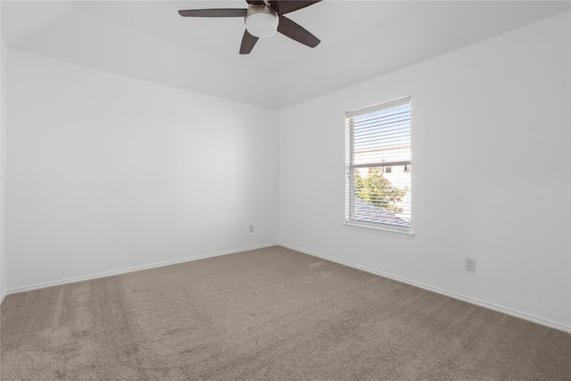 spare room featuring carpet flooring and ceiling fan