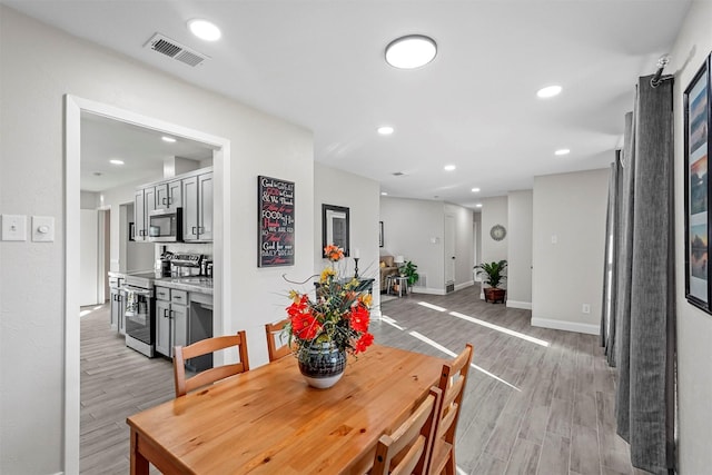 dining area featuring light hardwood / wood-style floors