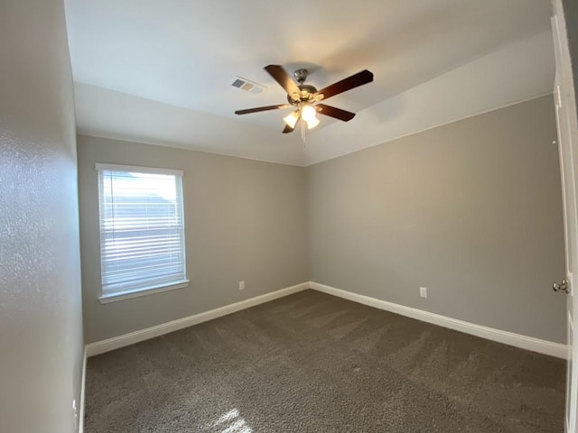 carpeted empty room with ceiling fan