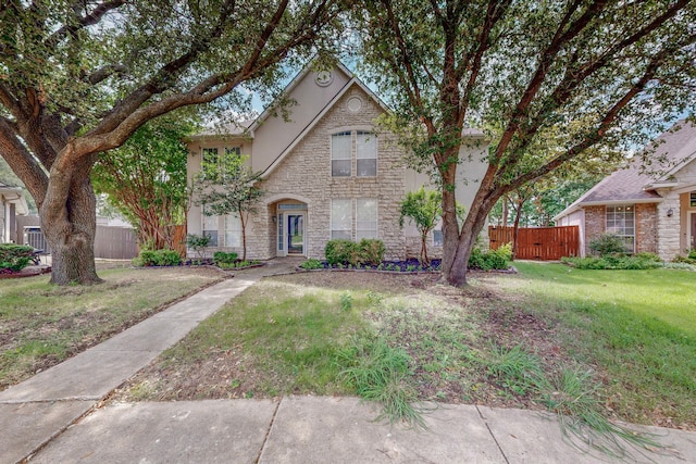 view of front of home with a front lawn