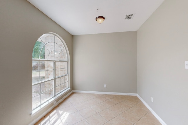 view of tiled empty room