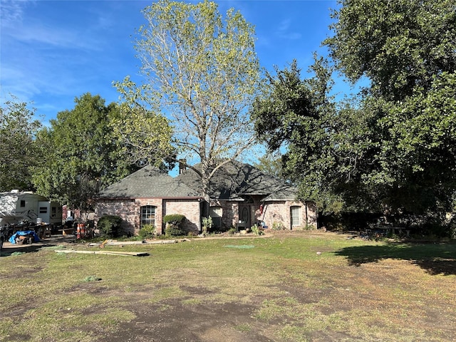 view of front of house with a front yard