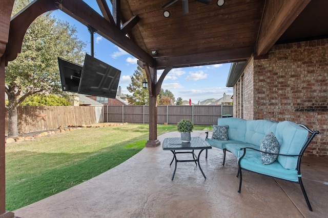 view of patio / terrace with an outdoor living space and ceiling fan