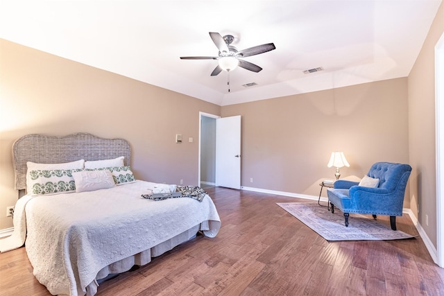 bedroom featuring hardwood / wood-style flooring and ceiling fan