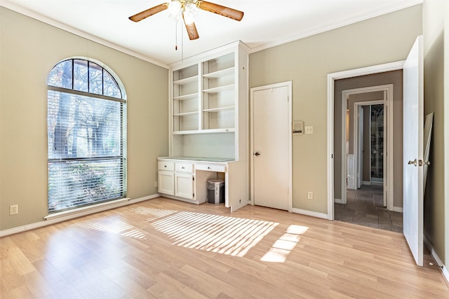 unfurnished bedroom featuring light hardwood / wood-style floors and ceiling fan