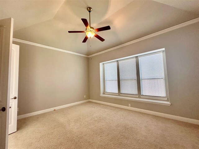 unfurnished room featuring ornamental molding and lofted ceiling