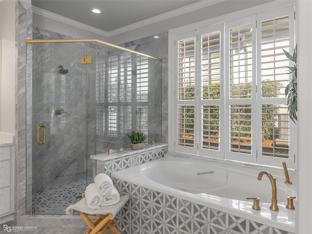 bathroom featuring independent shower and bath, ornamental molding, and a healthy amount of sunlight