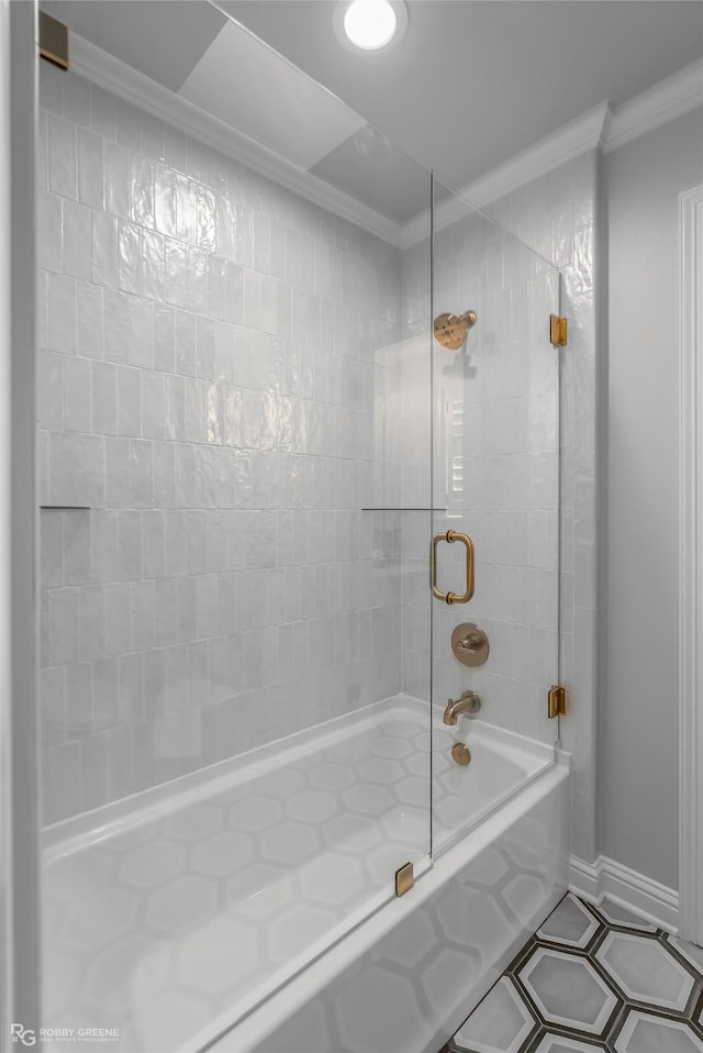 bathroom with crown molding, combined bath / shower with glass door, and tile patterned floors