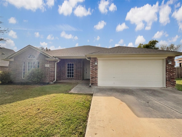 ranch-style home featuring a garage and a front lawn