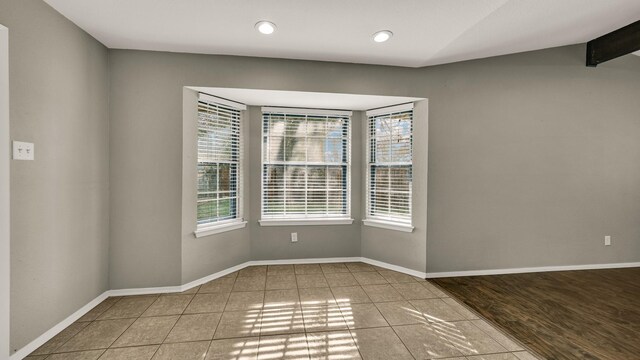 empty room with light wood-type flooring