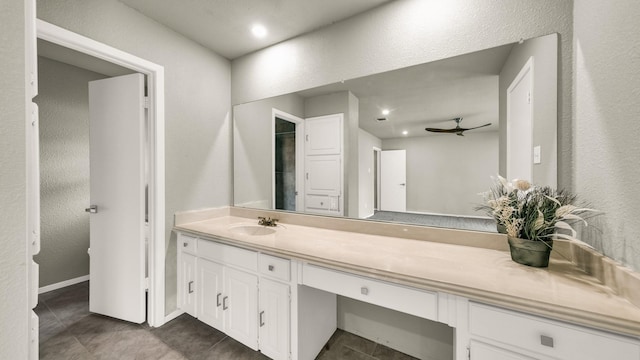 bathroom featuring ceiling fan, tile patterned flooring, and vanity