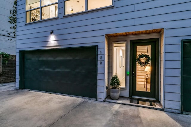 entrance to property featuring a garage