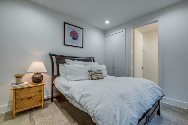 bedroom with a closet and carpet