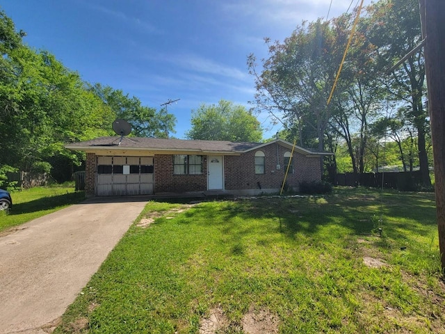 single story home featuring a front yard and a garage