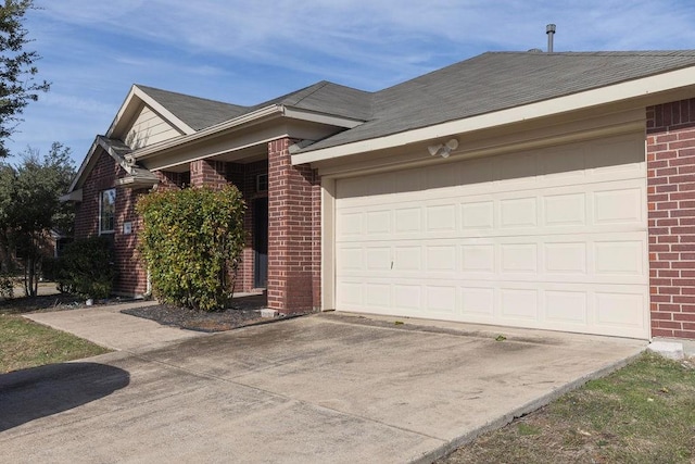 ranch-style home featuring a garage