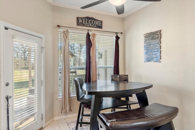 dining space featuring plenty of natural light, ceiling fan, and ornamental molding