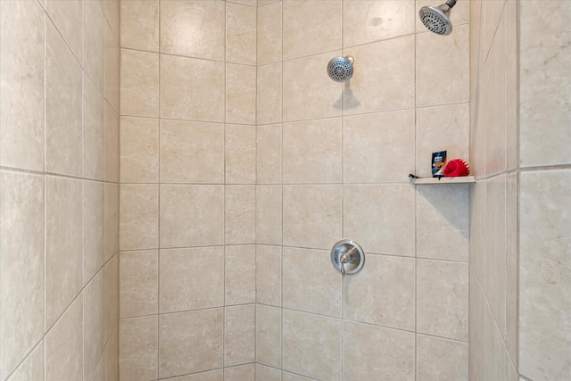 bathroom featuring tiled shower