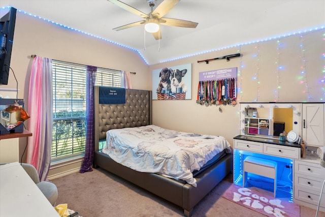 bedroom featuring ceiling fan, light colored carpet, and lofted ceiling