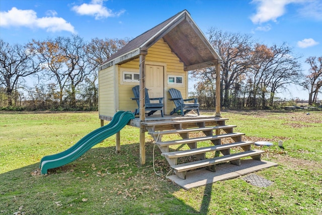 view of jungle gym with a lawn