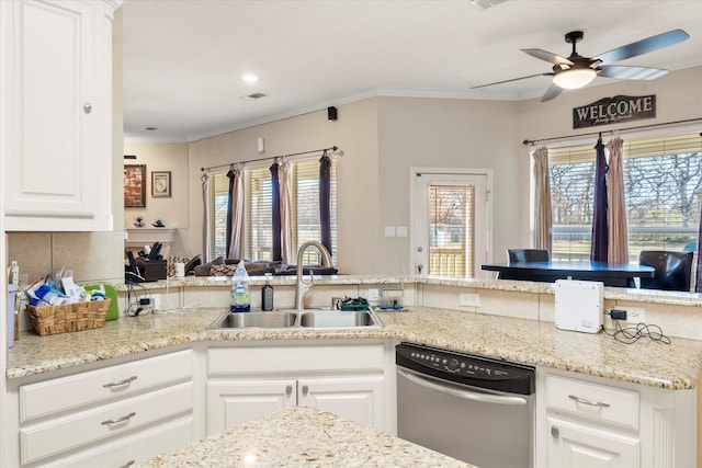 kitchen with dishwasher, white cabinetry, sink, and kitchen peninsula